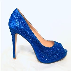Dazzling candy blue pumps by Lauren Lorraine.